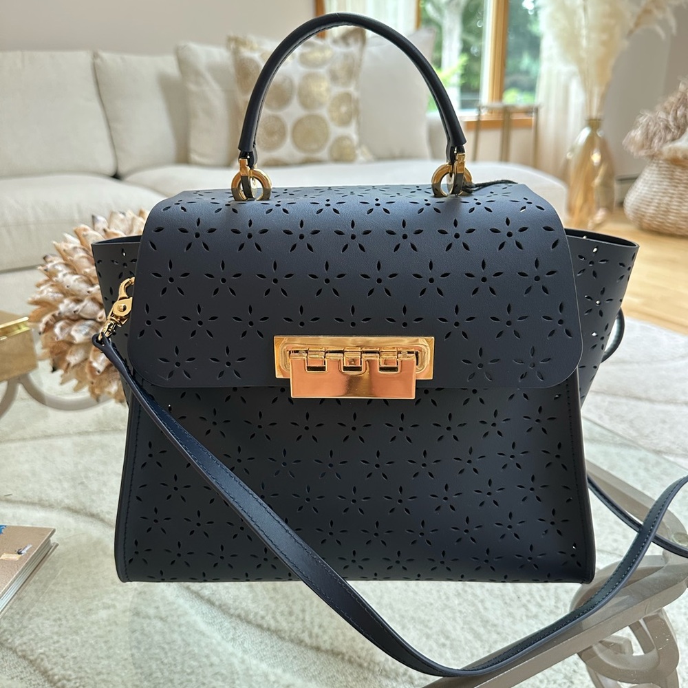 Elegant Blue Handbag with Gold Accents
